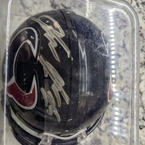 Signed Black and Red Hockey Puck
